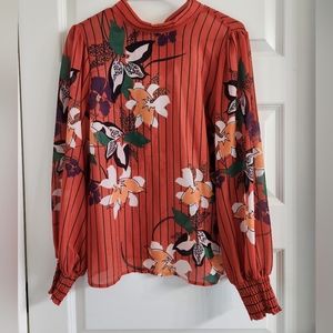Autumn Colors.Floral/Striped Blouse.Never worn.Tie Neck Feature. Elastic wrists
